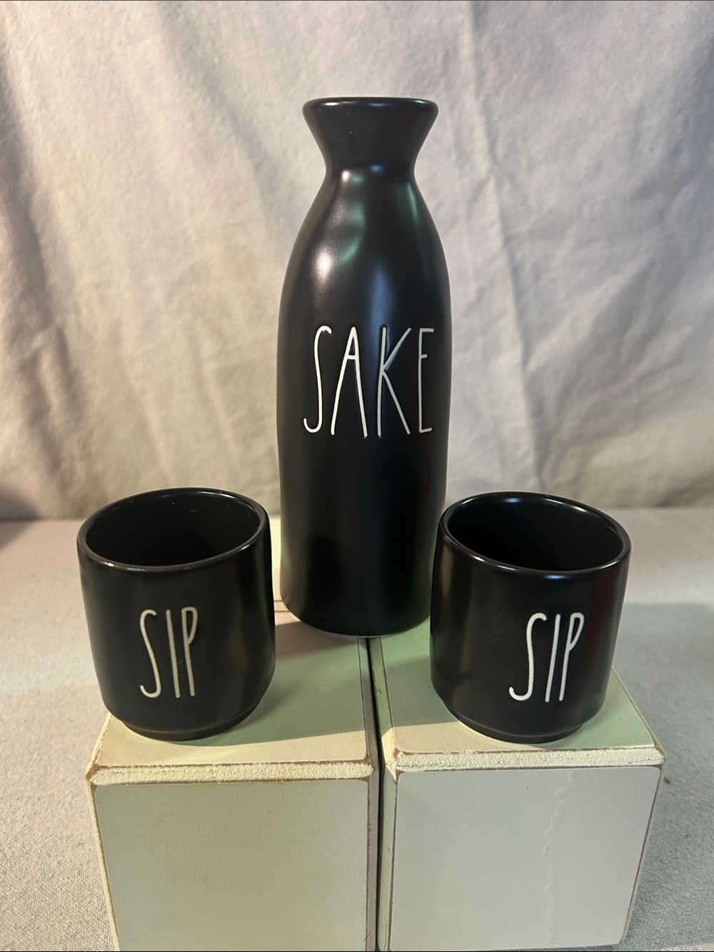 Rae Dunn Black 'SAKE' Bottle and Two 'SIP' Cups